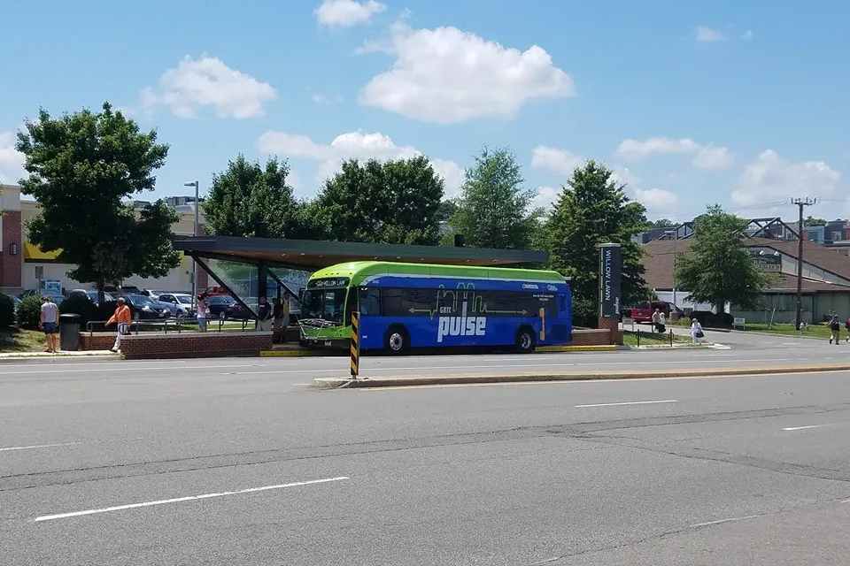 Pulse bus rapid transit station with blue bus pulled in in Richmond, Virginia